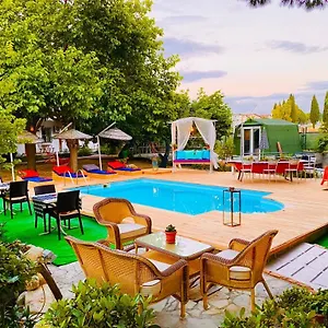 Проживание в семье Mursel Garden